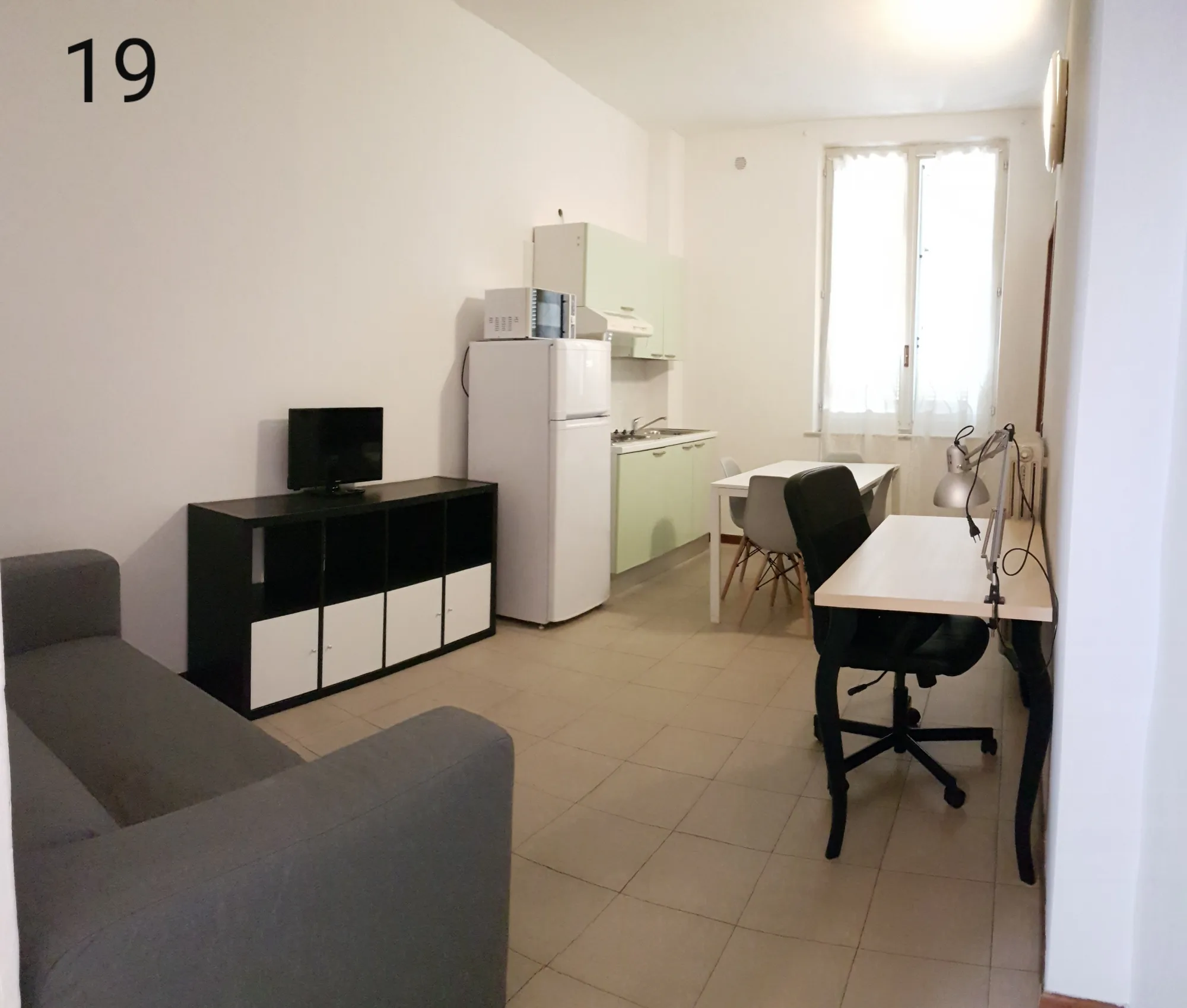 Cocina y Salón Apartamento de Dos Dormitorios Joivy Parma City