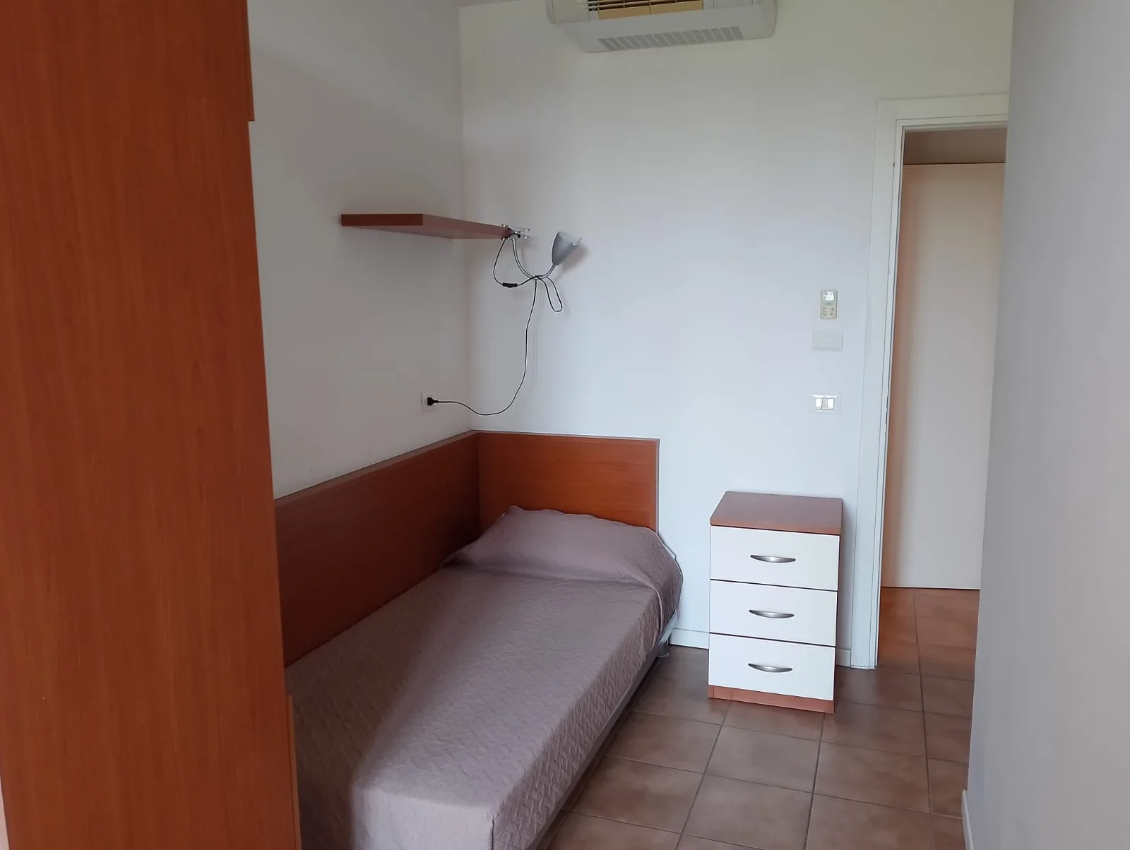 Dormitorio dentro del Apartamento de Dos Dormitorios en Joivy Parma Campus